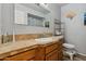 Bathroom featuring a large vanity, tile countertop, large mirror, and a tiled bath/shower at 1057 S 74Th St, Mesa, AZ 85208