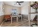 Office features a white desk, a rolling office chair and wood-look tile flooring at 1057 S 74Th St, Mesa, AZ 85208