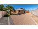 A backyard featuring desert landscaping, a storage shed, and privacy fencing at 1138 E Avenida Isabela St, Casa Grande, AZ 85122