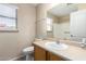Bathroom with sink, toilet, and shower/bath with grab bars at 1138 E Avenida Isabela St, Casa Grande, AZ 85122