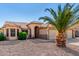 Charming home with a tile roof, low maintenance landscaping and an arched entryway at 1138 E Avenida Isabela St, Casa Grande, AZ 85122