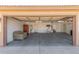 Spacious garage with ample storage, a utility sink and an automatic door at 1138 E Avenida Isabela St, Casa Grande, AZ 85122