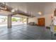 Spacious garage with ample storage, a utility sink and an automatic door at 1138 E Avenida Isabela St, Casa Grande, AZ 85122