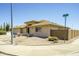 A beautifully maintained home with manicured desert landscaping and three car garage at 11447 E Mendoza Ave, Mesa, AZ 85209
