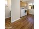 Well-equipped laundry room with modern appliances, cabinets, and a window at 11447 E Mendoza Ave, Mesa, AZ 85209