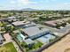 Beautiful backyard oasis featuring a pool, spa, cabana, basketball court, and lush landscaping in a well-maintained community at 1160 E Cedar Pl, Chandler, AZ 85249