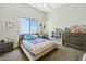 bedroom features a low bedframe, window, and dresser at 1160 E Cedar Pl, Chandler, AZ 85249
