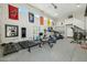 Large home gym with weights, treadmills, and banners at 1160 E Cedar Pl, Chandler, AZ 85249