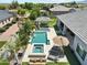 Resort-style pool and spa area with covered outdoor dining, lounge seating, and lush tropical landscaping at 1160 E Cedar Pl, Chandler, AZ 85249