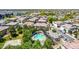 An aerial view showcasing a community pool, lounge area, and well-manicured landscaping at 14870 W Encanto Blvd # 2138, Goodyear, AZ 85395