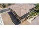 Contemporary style townhome showcasing a paved driveway and modern exterior design at 14870 W Encanto Blvd # 2138, Goodyear, AZ 85395