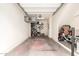 Well-organized garage with a bicycle, storage racks, and ample space at 14870 W Encanto Blvd # 2138, Goodyear, AZ 85395