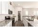 Bright kitchen features white cabinets, granite countertops, stainless appliances, and a convenient walk in pantry at 14870 W Encanto Blvd # 2138, Goodyear, AZ 85395