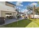 Backyard with a putting green, hot tub, patio, and outdoor dining area at 15027 N 19Th Way, Phoenix, AZ 85022