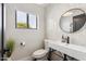 Chic half-bathroom with a modern vessel sink and stylish tiling at 15027 N 19Th Way, Phoenix, AZ 85022