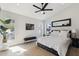 Bedroom with high ceilings, plenty of natural light, and a modern ceiling fan at 15027 N 19Th Way, Phoenix, AZ 85022