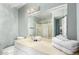 Bright bathroom with a cream colored vanity and a shower with sliding glass doors at 1756 N Summer Cir, Mesa, AZ 85203