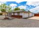 Charming home featuring an attached two-car garage and a neatly maintained exterior at 1756 N Summer Cir, Mesa, AZ 85203