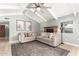 Comfortable living room with a brick fireplace and high ceilings at 1756 N Summer Cir, Mesa, AZ 85203
