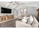 Cozy living room with natural light, a brick fireplace, and a comfortable seating area at 1756 N Summer Cir, Mesa, AZ 85203