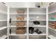 Organized pantry featuring multiple shelves for maximum storage capacity and clean, white shelves at 1756 N Summer Cir, Mesa, AZ 85203