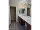 Bathroom with a double sink vanity and tile floors at 1794 N Agave St, Casa Grande, AZ 85122