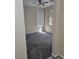 Bedroom featuring neutral walls, gray carpet, and plenty of natural light at 1794 N Agave St, Casa Grande, AZ 85122