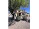 Charming two-story home featuring desert landscaping and a light exterior paint scheme at 1794 N Agave St, Casa Grande, AZ 85122