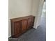 Hallway featuring a built-in cabinet and plush carpeting at 1794 N Agave St, Casa Grande, AZ 85122