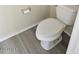 Close-up of toilet featuring tile floors at 1794 N Agave St, Casa Grande, AZ 85122