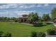 A lovely community park with landscaping and seating next to a covered picnic area at 18731 W San Juan Ave, Litchfield Park, AZ 85340