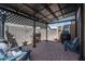 Outdoor patio area with pavers, furniture, and a grill for outdoor cooking and relaxation at 18731 W San Juan Ave, Litchfield Park, AZ 85340