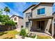 This backyard offers a relaxing space with a covered patio, perfect for enjoying the outdoors at 1944 N Lazona Dr, Mesa, AZ 85203