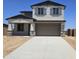 Charming two-story home with stone accents and a spacious two-car garage at 22400 W Monona Ln, Surprise, AZ 85387