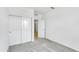 Bedroom with carpet flooring, a sliding door closet, and white walls at 24610 W Bowker St, Buckeye, AZ 85326