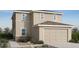 Two-story home with a neutral color scheme and a two-car garage with natural rock landscaping at 25161 N 167Th Ave, Surprise, AZ 85387