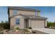 Charming two-story home with a neutral color palette and a well-manicured, low maintenance desert landscape at 25168 N 167Th Ave, Surprise, AZ 85387