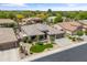 An aerial view of the property featuring an artificial lawn and a three car garage at 2612 S Jacob St, Gilbert, AZ 85295