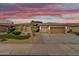 Inviting single-story home featuring desert landscaping and a two-car garage at 2612 S Jacob St, Gilbert, AZ 85295