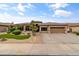 Well-maintained single-story home featuring desert landscaping and a two-car garage at 2612 S Jacob St, Gilbert, AZ 85295