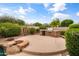 Beautiful outdoor area with fire pit, built-in barbecue, and lush landscaping perfect for entertaining at 2612 S Jacob St, Gilbert, AZ 85295