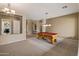 Recreation room with pool table and neutral color scheme, perfect for entertainment and relaxation at 2612 S Jacob St, Gilbert, AZ 85295