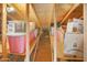 View of attic space with shelving for extra storage at 2663 N Carriage Ln, Chandler, AZ 85224