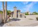 View of the home's exterior highlighting a private backyard, patio area, and landscaping at 2663 N Carriage Ln, Chandler, AZ 85224
