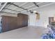 Spacious garage with lots of storage and epoxy flooring at 2663 N Carriage Ln, Chandler, AZ 85224