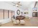 Bright and airy living area with beamed, vaulted ceilings and contemporary decor at 2663 N Carriage Ln, Chandler, AZ 85224