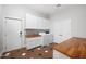 Bright laundry room featuring cabinets, counter, washer, and dryer at 2988 E Comstock Dr, Gilbert, AZ 85296