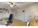 A bright bedroom with hardwood floors and a ceiling fan at 3002 E Montecito Ave, Phoenix, AZ 85016