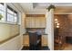 Home office space with built-in desk, storage, and natural light at 3002 E Montecito Ave, Phoenix, AZ 85016