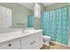 Bathroom featuring a vanity with a sink, toilet, and a shower with a patterned curtain at 3044 E Sparrow Pl, Chandler, AZ 85286